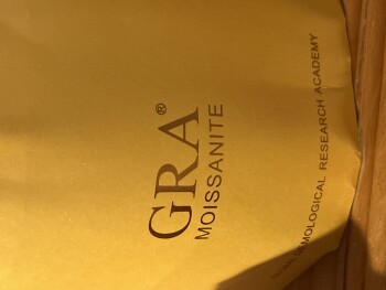 Rapport de sécurité du consommateur A strange ring Gra moissanite brand ring and paper work for a warranty. Totally bogus scam that floa... photo #3