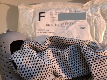 Weird scarf in rubber container??? photo #1