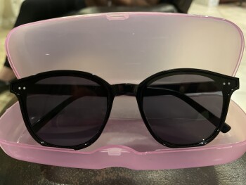 Received a pair of plastic sunglasses from Carrie Bonkiewicz photo #1